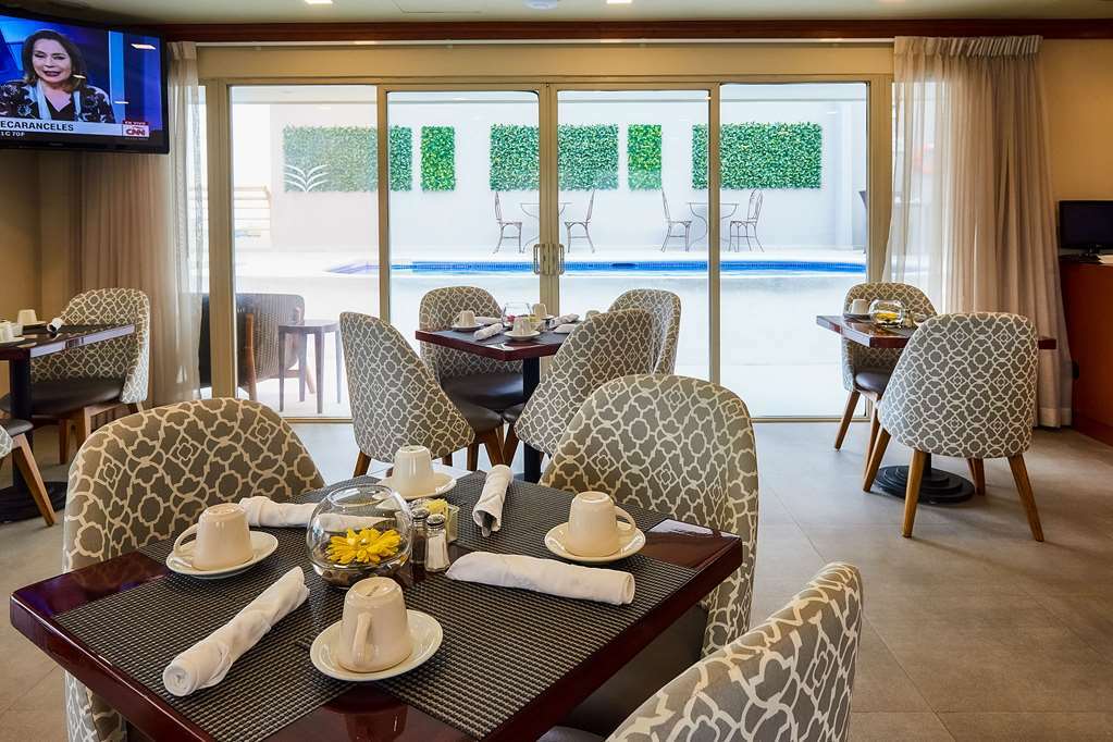 Suites Las Palmas, Hotel & Apartments. San Salvador Restaurant photo